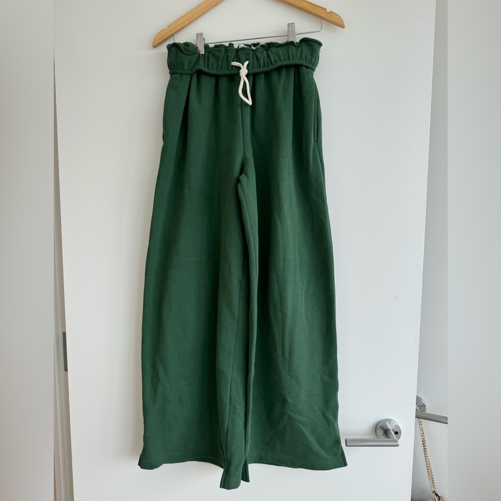 green out from under sweatpants